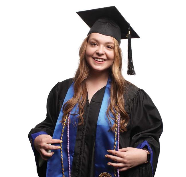Anna Triska 22 in graduation robe and cap